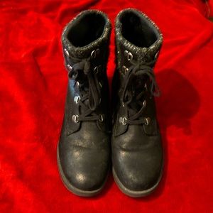 Women’s size 9 fashion, black boots, side zip with laces strung in front. Lined